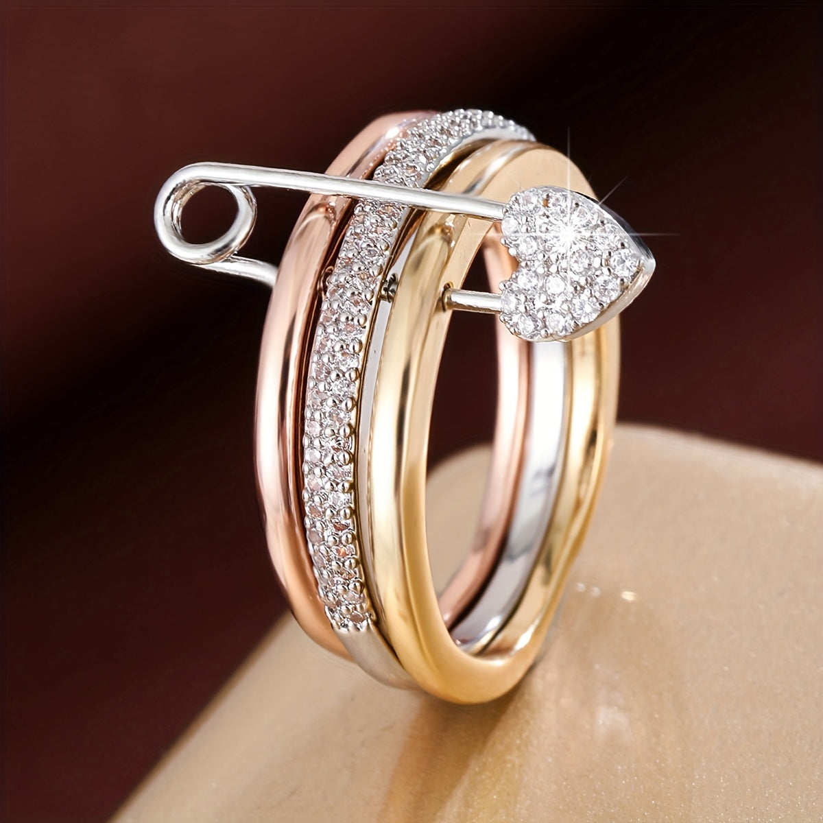 A Women'S Ring Designed with a Detachable Three-Ring Structure, Featuring Heart-Shaped Pins And Set with Zirconia Stones
